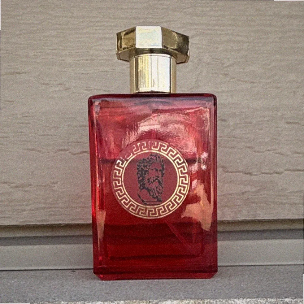 Versace Red Bottle Men's Fragrance with Gold Cap and Medusa Logo